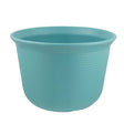 Blue ribbed planter on a white background