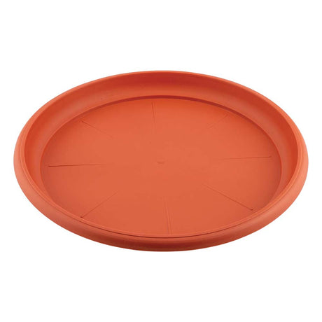 Large planter saucer in orange on a white background