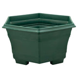 Green lakeside planter in hexagonal design on a white background