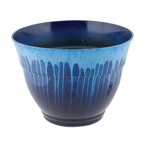 Luster planter with striking blue design on a white background