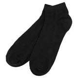 Men's 3 pack trainer socks in black on a white background