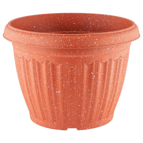Speckled plastic garden pot in orange on a white background