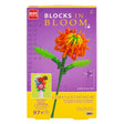 Box of 'Blocks in Bloom' Chrysanthemum building set with colorful flower design on a white background