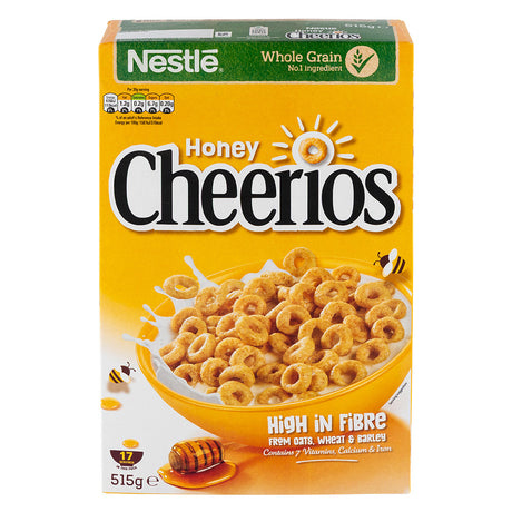 Box of Nestle Honey Cheerios 515g cereal on a white background